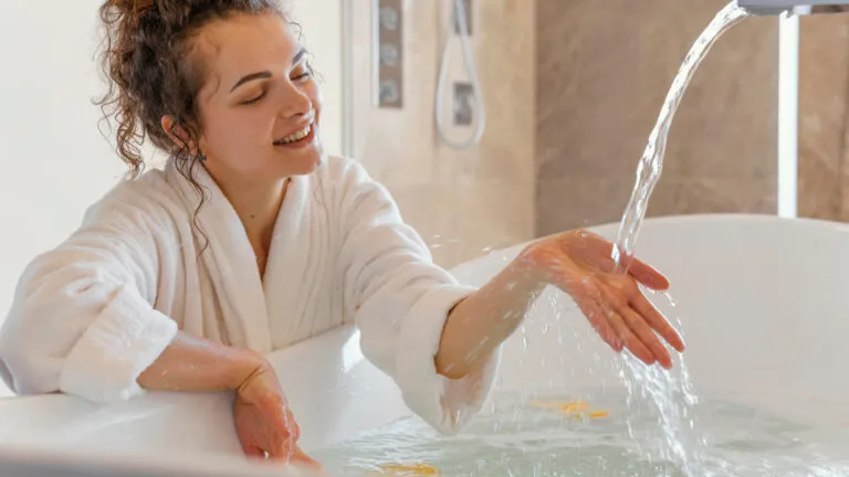 Woman is enjoying hot water
